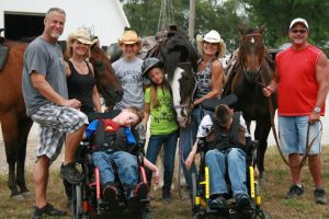 The Branson Family with friends and business associates Laura and Sean Reavis. 