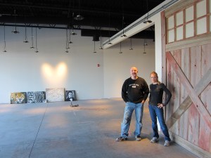 Kevin Kuster and Kerry Hoskins Branson stand in the Creator Gallery space being prepared for opening in late 2012