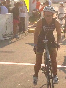 Julie mounts her bike at 7:45 in the morning for a 56 mile journey on rough Wisconsin side roads.